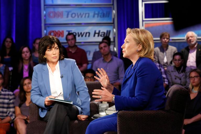 Hillary Rodham Clinton speaks during CNN's Town Hall interview on Tuesday, June 17, 2014, in New York. The former secretary of state expressed caution Tuesday about the United States working with Iran to combat fast-moving Islamic insurgents in Iraq, saying the U.S. needs to understand 