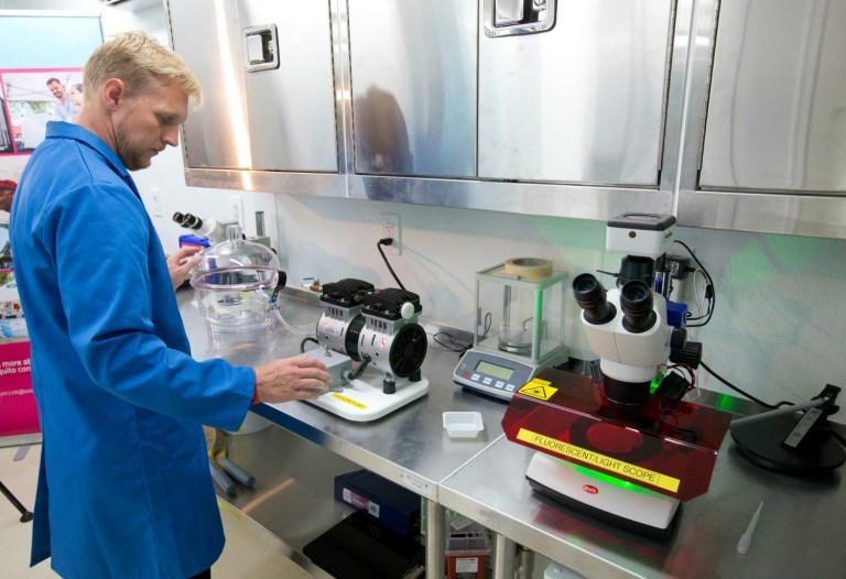 Officials at Puerto Rico's two Planned Parenthood clinics say they're aware of the faraway battle in Washington over Zika funding, but they are mostly just carrying on with their work. (AP Photo/Wilfredo Lee)