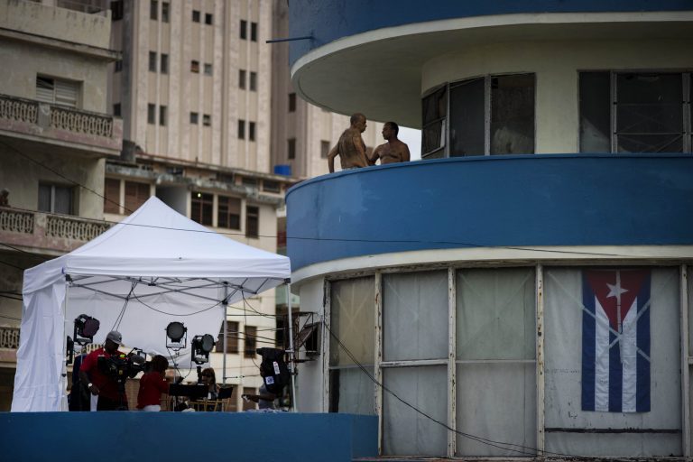A television crew sets up its equipment front of the US embassy, in Havana, Cuba, Tuesday, Aug. 11, 2015. (AP Photo/Ramon Espinosa)