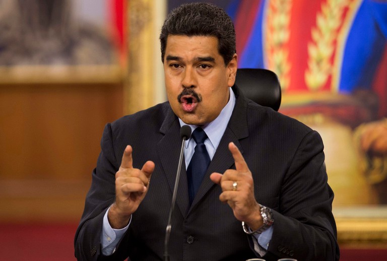 Venezuela's President Nicolas Maduro said he does not want CNN operating in his country anymore after the news network published a report that said officials in Venezuela's embassy in Iraq have sold passports and visas to suspected terrorists. (AP Photo/Ariana Cubillos)