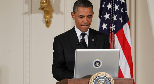 President Obama shown using his laptop. AP Photo