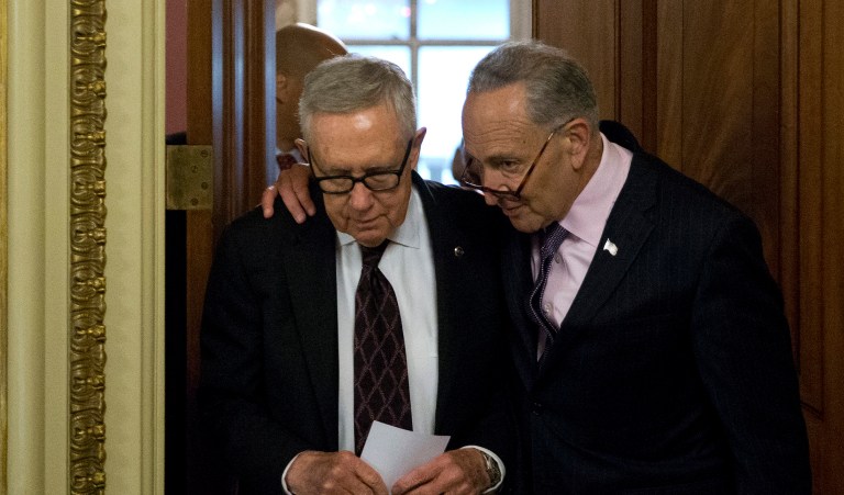 Three years ago, Sen. Harry Reid, D-Nev., left, abolished the Senate minority's ability to filibuster most presidential nominations. The Senate majority leader is shown above with his expected successor, Sen. Charles Schumer, D-N.Y. (AP Photo/Alex Brandon)