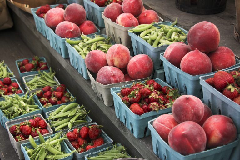 This photo taken June 8, 2013 shows peaches, strawberries, and snap peas are for sale at a roadside market outside Gettysburg, Pa. Pregnant women, mothers and children who get federal assistance with their grocery bills will now be able to buy more whole-grain foods, yogurt, fish, fruits and vegetables. The changes to the Special Supplemental Nutrition Program for Women, Infants, and Children, known as WIC, will go into place by next year.  (AP Photo/J. Scott Applewhite)