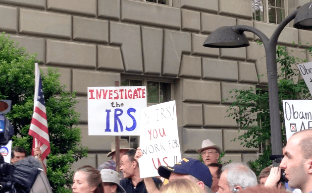 In Washington, D.C., Tea Party activists spend lunch hour protesting at the IRS