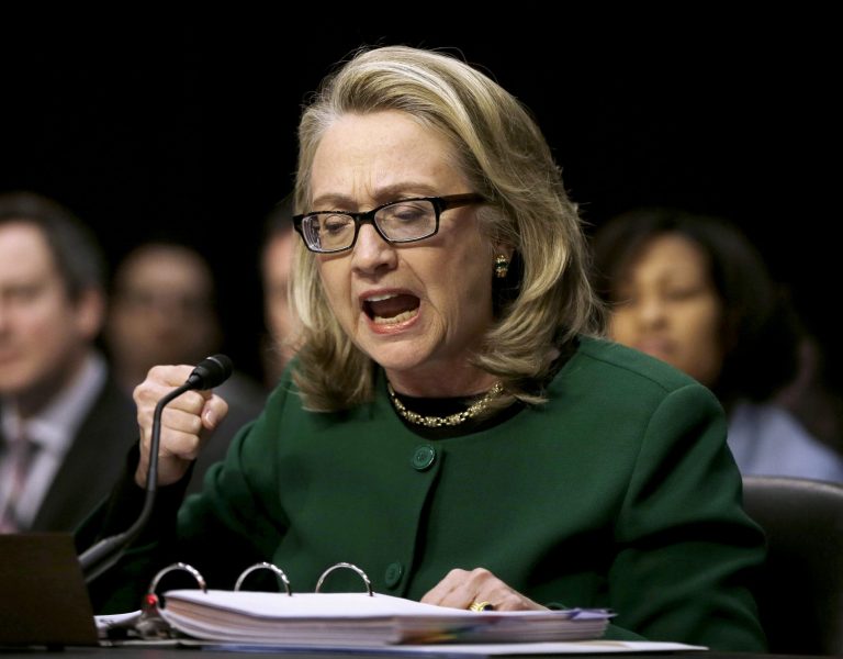 Secretary of State Hillary Rodham pounds her fist as she testifies on Capitol Hill in Washington, Wednesday, Jan. 23, 2013. She is testifying again today.Â (AP Photo/Pablo Martinez Monsivais)