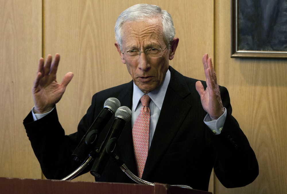 Fed official hints at rate hike, says inflation is coming