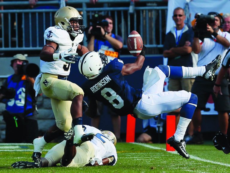 Rob Carr/Getty Images
Tra'ves Bush (9) and Parrish Gaines have started all 12 games for the Midshipmen, who have improved from 67th to 36th in passing defense since last season.