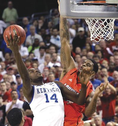 David J. Phillip/AP
Michael Kidd-Gilchrist played just 23 minutes against Louisville on Saturday because of foul trouble.
