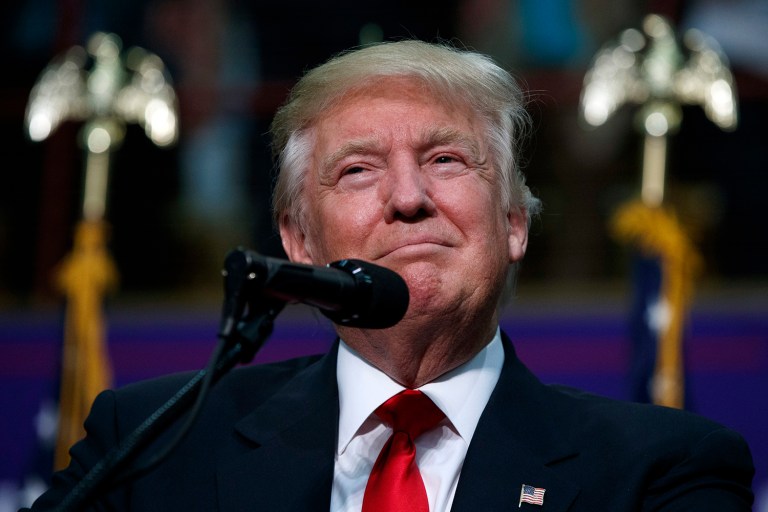 Republican presidential candidate Donald Trump is holding onto a slim lead against Hillary Clinton in North Carolina. (AP Photo/Evan Vucci)