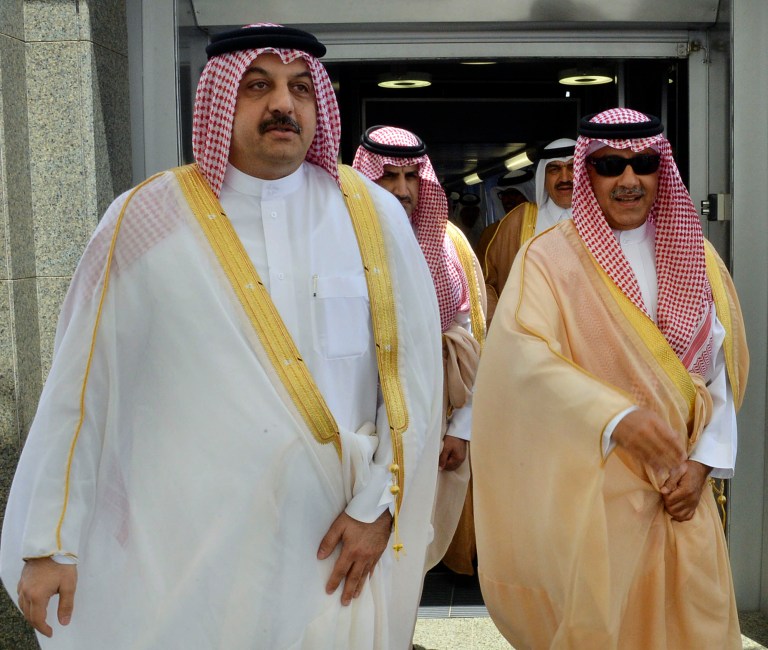 Qatari Foreign Minister Khalid bin Mohammed al-Attiyah, left, arrives to attend a meeting of Gulf foreign ministers in Jeddah, Saudi Arabia, Saturday Aug. 30, 2014. The meeting of Gulf foreign ministers ended on Saturday without a clear way out of a monthslong diplomatic spat with Qatar, although some envoys signaled that progress had been made. Saudi Arabia, along with the United Arab Emirates and Bahrain, withdrew their ambassadors from Qatar in March in an unprecedented public protest largely believed to be spurred by the tiny nation's support for Islamist groups in Egypt, Libya, the Gaza Strip and elsewhere. (AP Photo/Saudi Press Agency)