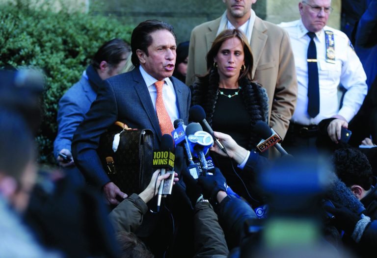 Mark Heller, an attorney for actress Lindsay Lohan, leaves the courthouse, Monday, Jan. 7, 2013, in New York. Heller signed paperwork at the courthouse in connection with Lohan's alleged fight at a Manhattan nightclub on Nov. 29, 2012. (AP Photo/Seth Wenig)