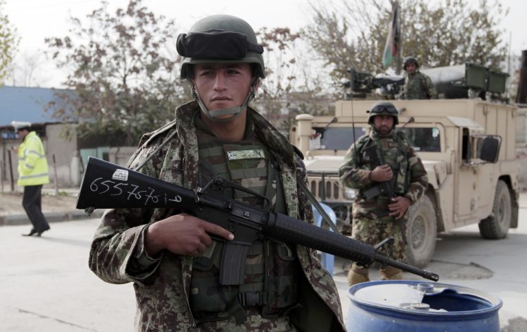 President Hamid Karzai urged tribal elders Thursday to approve a security pact with Washington that could keep thousands of U.S. troops in Afghanistan until 2024, but he added a wrinkle that he prefers his successor sign the document after elections next April. (AP Photo/Rahmat Gul)