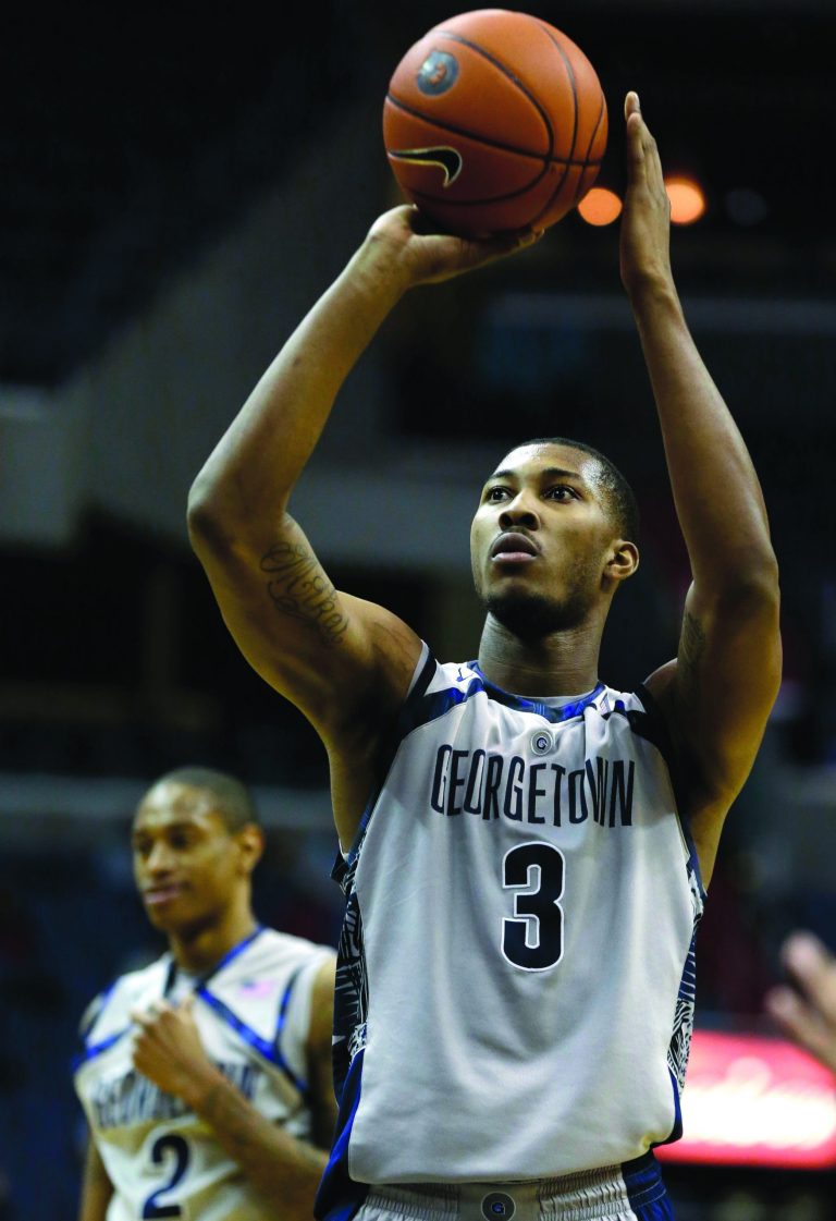 Jacquelyn Martin/AP
It isn't clear when Mikael Hopkins and Georgetown will leave the Big East or what the new conference will look like.