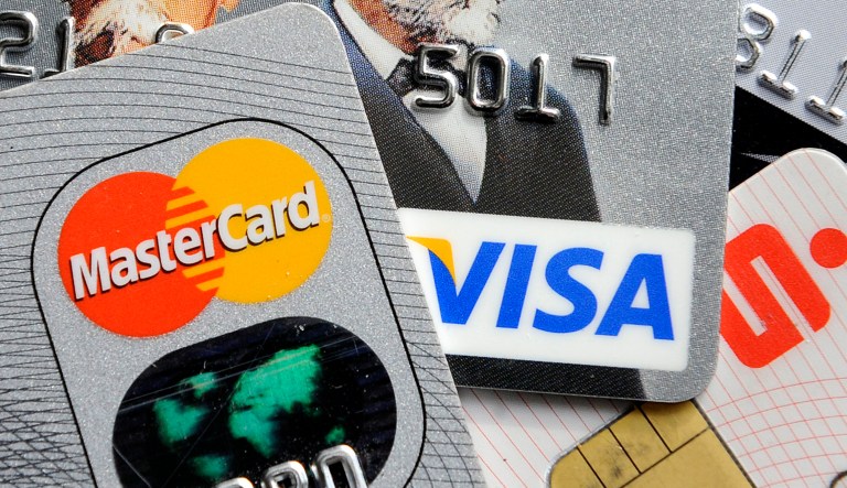 The annual tab for both debit and credit swipe fees has swollen to $70 billion. That's big money - hundreds of dollars each year for every family in the country. That means everybody has less spending power and economic growth suffers. (AP Photo/Martin Meissner, File)