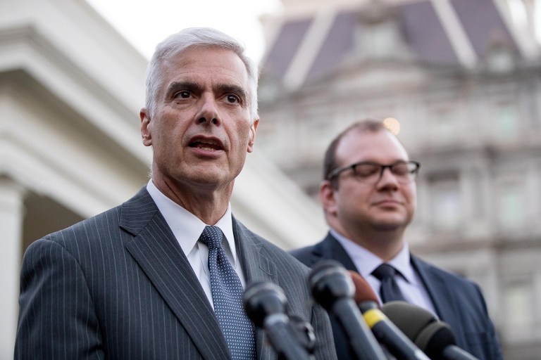 Club for Growth president David McIntosh, left, accompanied by FreedomWorks President Adam Brandon, right, speaks to members of the media outside the West Wing of the White House, Wednesday, March 8, 2017, in Washington. President Donald Trump met with conservative leaders about healthcare. (AP Photo/Andrew Harnik)