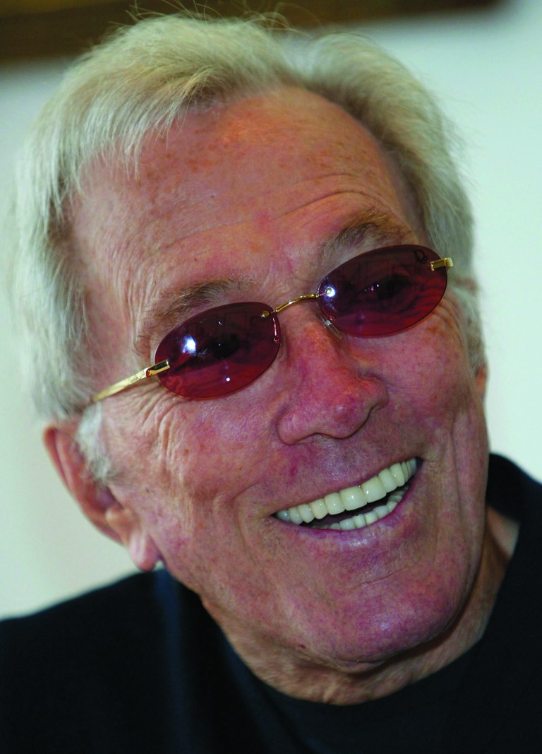 FILE - In this July 25, 2004 file photo, U.S. singer Andy Williams smiles as he speaks to reporters during his news conference at a Tokyo hotel. Emmy-winning TV host and 
