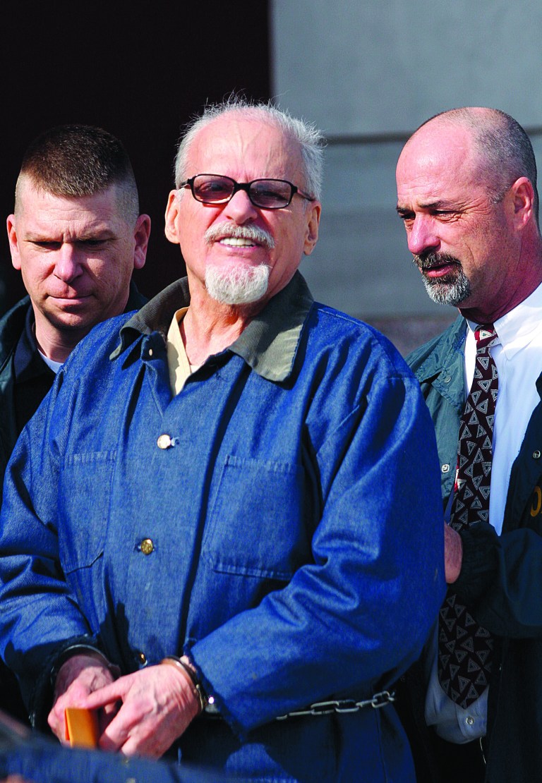 FILE - In this Jan. 13, 2012 file photo, Tony Alamo leaves the Federal courthouse shortly after his restitution hearing in downtown Texarkana, Ark. A federal appeals court says punitive damages should be reduced from $60 million to $24 million in the case of an Alamo, a evangelist who ordered two boys to be beaten. (AP Photo/ The Texarkana Gazette, Eric J. Shelton, File) MANDATORY CREDIT