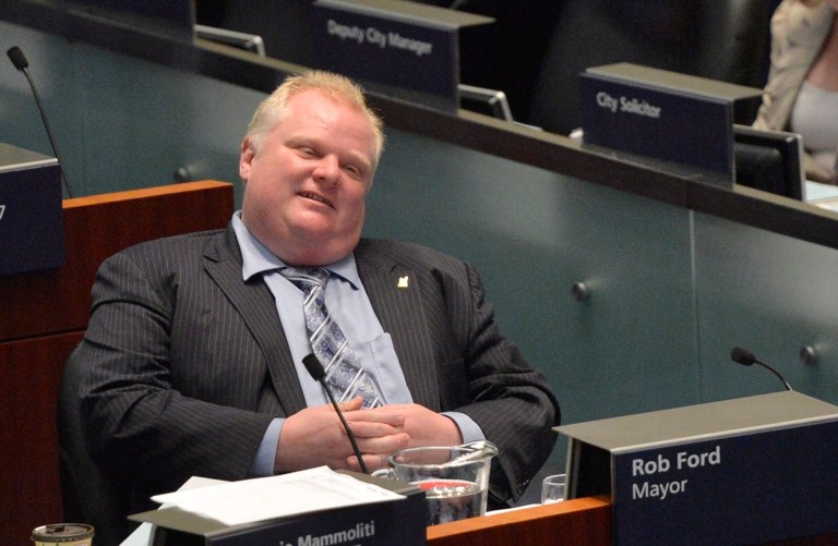Toronto Mayor Rob Ford sits during a City council meeting at Toronto City Hall on Tuesday May 21, 2013. Ford ignored a crush of reporters waiting outside his city hall office this morning in the hopes he would address allegations that he was recorded on video appearing to smoke crack cocaine. (AP Photo/THE CANADIAN PRESS,Nathan Denette)