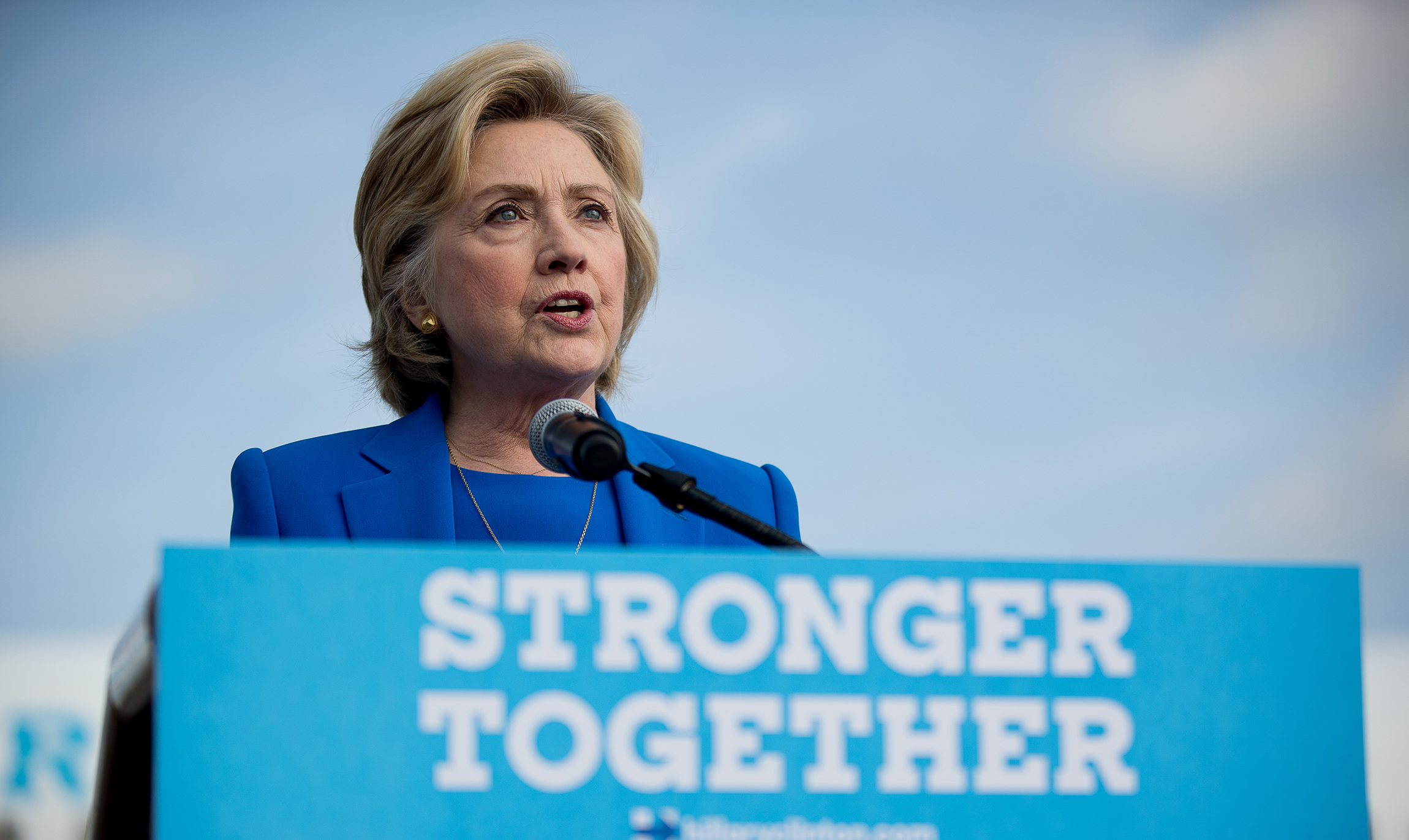 In pitch to African-Americans, Clinton bashes Trump for birther talk
