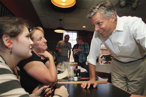 Huntsman: I believe global warming and evolution