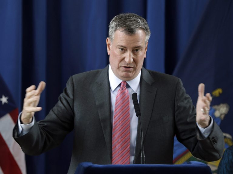FILE- In this Feb. 25, 2014 file photo, New York City Mayor Bill de Blasio speaks during a news conference at P.S. 130 in New York. As state lawmakers settle in on a plan to fund pre-kindergarten in New York City, de Blasio is beginning to focus on other items in his progressive agenda. De Blasio will set his sights on massively expanding affordable housing, hiking wages for the working class and overhauling the city's recovery from Superstorm Sandy.  (AP Photo/Seth Wenig, File)