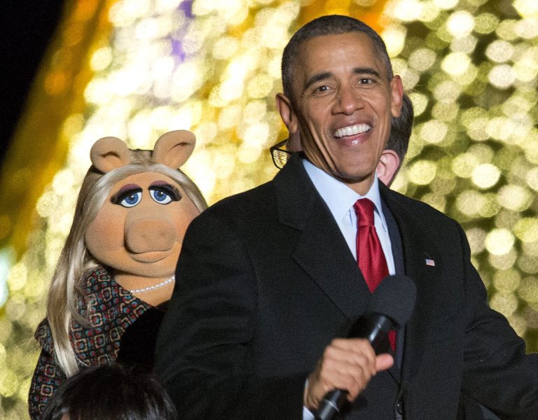President Barack Obama and Miss Piggy onstage during the National Christmas Tree Lighting ceremony at the Ellipse in Washington, Thursday. (AP Photo/Pablo Martinez Monsivais)