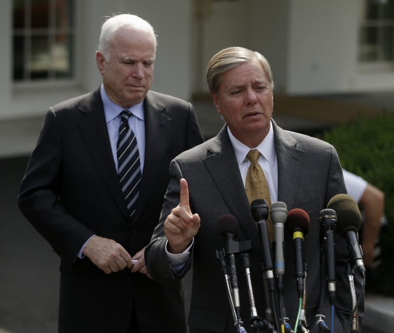 Sen. Lindsey Graham, R-S.C., right, accompanied by Sen. John McCain, R-Ariz., speaks with reporters outside the White House in Washington, Sept. 2, 2013. The two senior Republicans say the Obama administration's strategy to defeat terrorism in Syria by attacking the Islamic State of Iraq and Syria is only half-right, saying it must also simultaneously target the country's ruling Assad regime.Â (AP Photo/Pablo Martinez Monsivais)