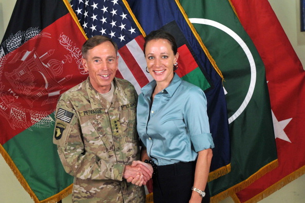 UNSPECIFIED - JULY 13, 2011:  In this handout image provided by the International Security Assistance Force (ISAF), former Commander of International Security Assistance Force and U.S. Forces-Afghanistan; CIA Director Gen. Davis Petraeus (L) shakes hands with biographer Paula Broadwell, co-author of 