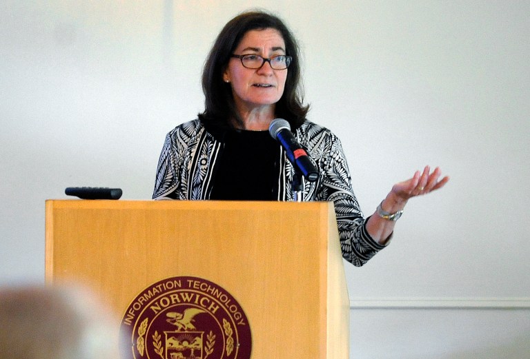 FTC Commissioner Julie Brill addresses a National Cyber Security Alliance conference Monday, Sept. 22, 2014, at Norwich University in Northfield, Vt. Brill, a Vermont resident who works in Washington, said the commission has investigated hundreds of cyber security breaches at companies across the country, but file lawsuits only when it finds systematic failures in a company's data security practices. (AP Photo/The Times Argus, Stefan Hard)