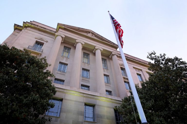 The Department of Justice headquarters in Washington is photographed on May 14. (AP Photo/J. David Ake)