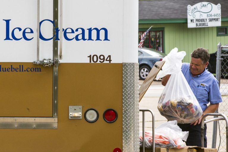 A Blue Bell Creameries employee loads recalled ice cream into a truck after picking it up from a convenience store on Thursday, April 23, 2015, in Brenham, Texas. (Smiley N. Pool/The Dallas Morning News)