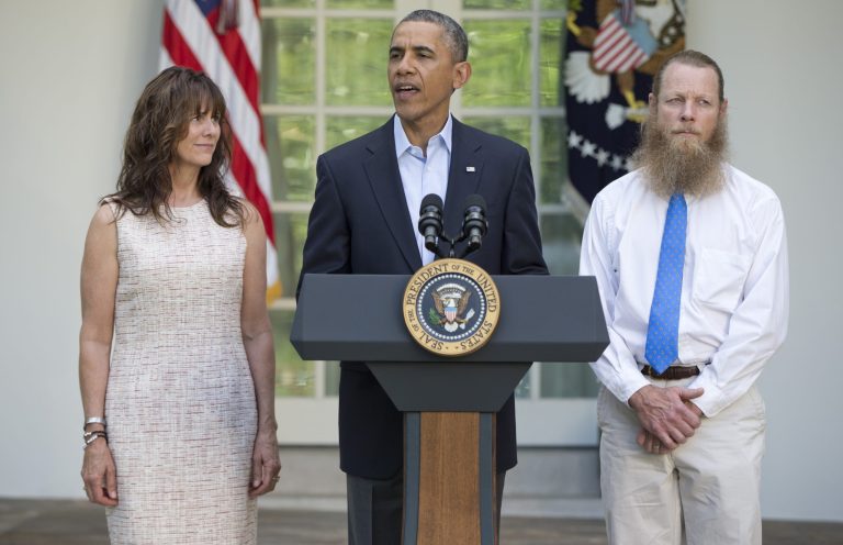 President Obama, accompanied by Jani Bergdahl, left, and Bob Bergdahl, speaks during a news conference in the Rose Garden of the White House in Washington on Saturday, May 31, 2014 about the release of their son, U.S. Army Sgt. Bowe Bergdahl. (AP Photo/Carolyn Kaster)