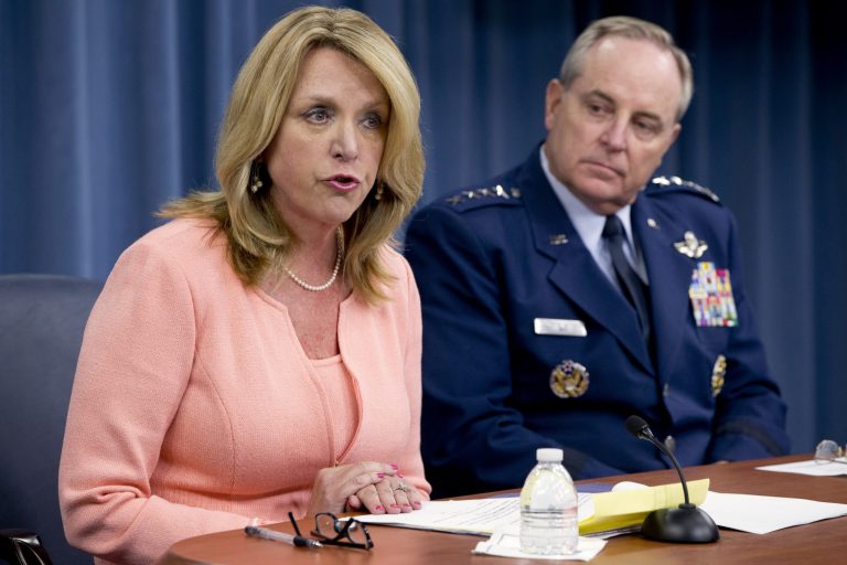 Air Force Secretary Deborah Lee James, left, accompanied by Air Force Chief of Staff Gen. Mark Welsh III, speaks about the current state of the Air Force, Monday, Aug. 24, 2015, during a briefing at the Pentagon. (AP Photo/Jacquelyn Martin)