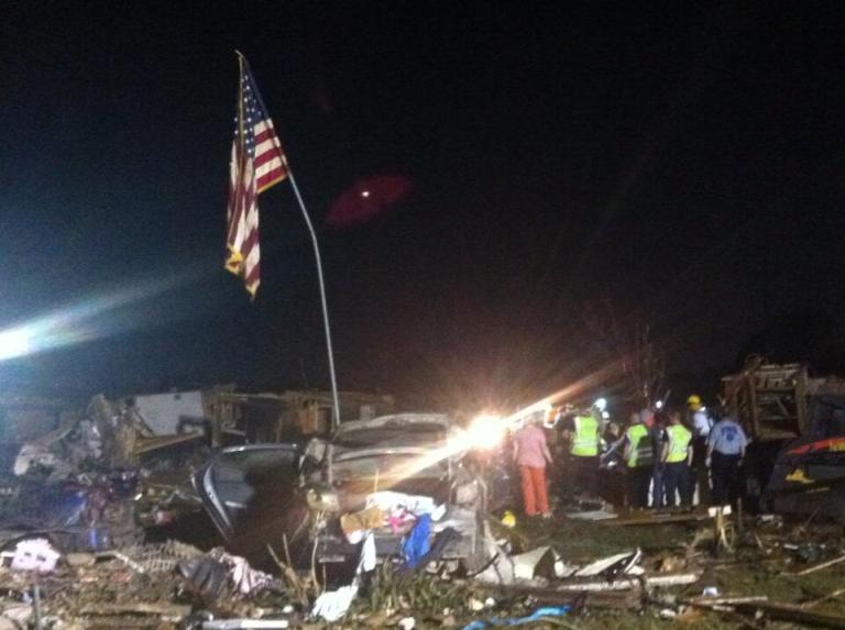 Six inspiring photos of flags rising above the rubble in Oklahoma