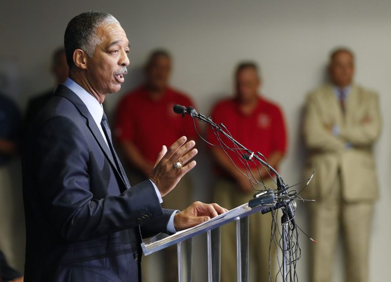 Arvin Jones, General Motors North American manufacturing manager, announces Wednesday, Aug. 27, 2014, at the GM plant in Spring Hill, Tenn., that GM is moving production of the next-generation Cadillac SRX crossover SUV from Mexico to Spring Hill. The company also announced Wednesday that it will add some small gasoline engines to the Spring Hill complex. (AP Photo/Mark Humphrey)
