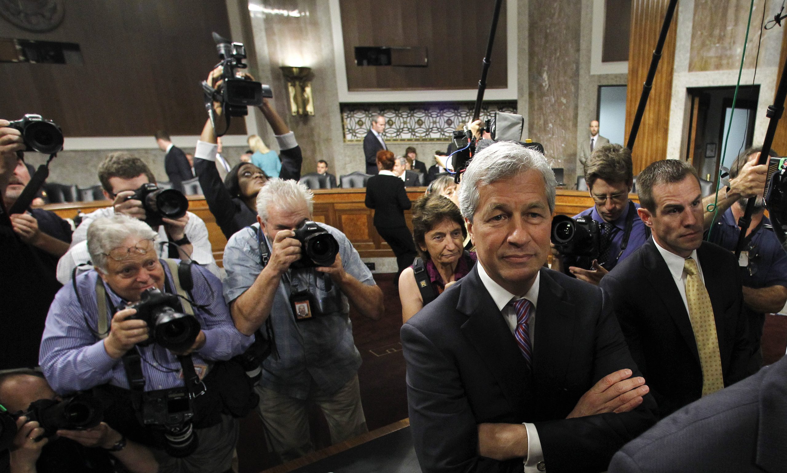 JPMorgan CEO says execs may have pay taken back
