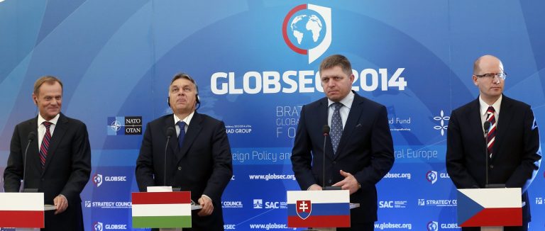 Poland's Prime Minister Donald Tusk, left, Hungary's Prime Minister Viktor Orban, 2nd left, Czech Republic's Prime Minister Bohuslav Sobotka, right, and Slovakia's Prime Minister Robert Fico, 2nd right, address media during a press conference at the Globsec 2014 security forum in Bratislava, Slovakia, Thursday, May 15, 2014. (AP Photo/Petr David Josek)