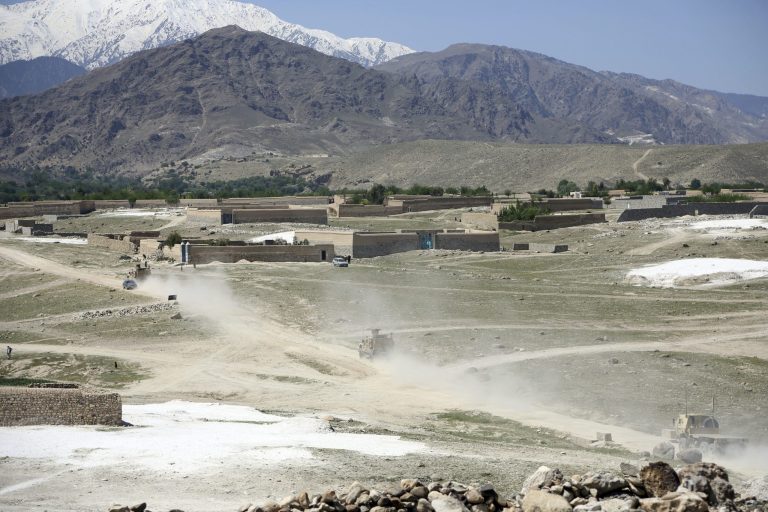 U.S. forces and Afghan commandos patrol Pandola village near the site of a U.S. bombing in the Achin district of Jalalabad, east of Kabul, Afghanistan, Friday, April 14, 2017. U.S. forces in Afghanistan on Thursday struck an Islamic State tunnel complex in eastern Afghanistan with the largest non-nuclear weapon every used in combat by the U.S. military, Pentagon officials said. (AP Photo/Rahmat Gul)