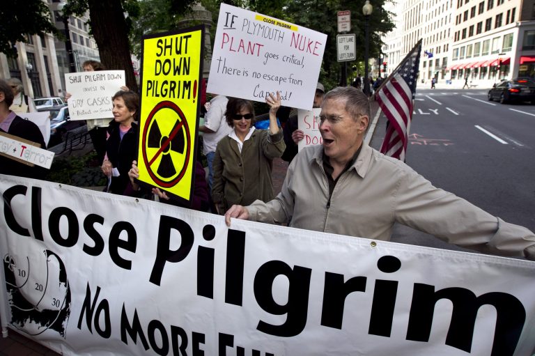 Protesters call for the closure of the Pilgrim Nuclear Power Plant as they demonstrate outside a hearing of the Atomic Safety and Licensing Board in Boston in June 2012. (AP Photo/Steven Senne)