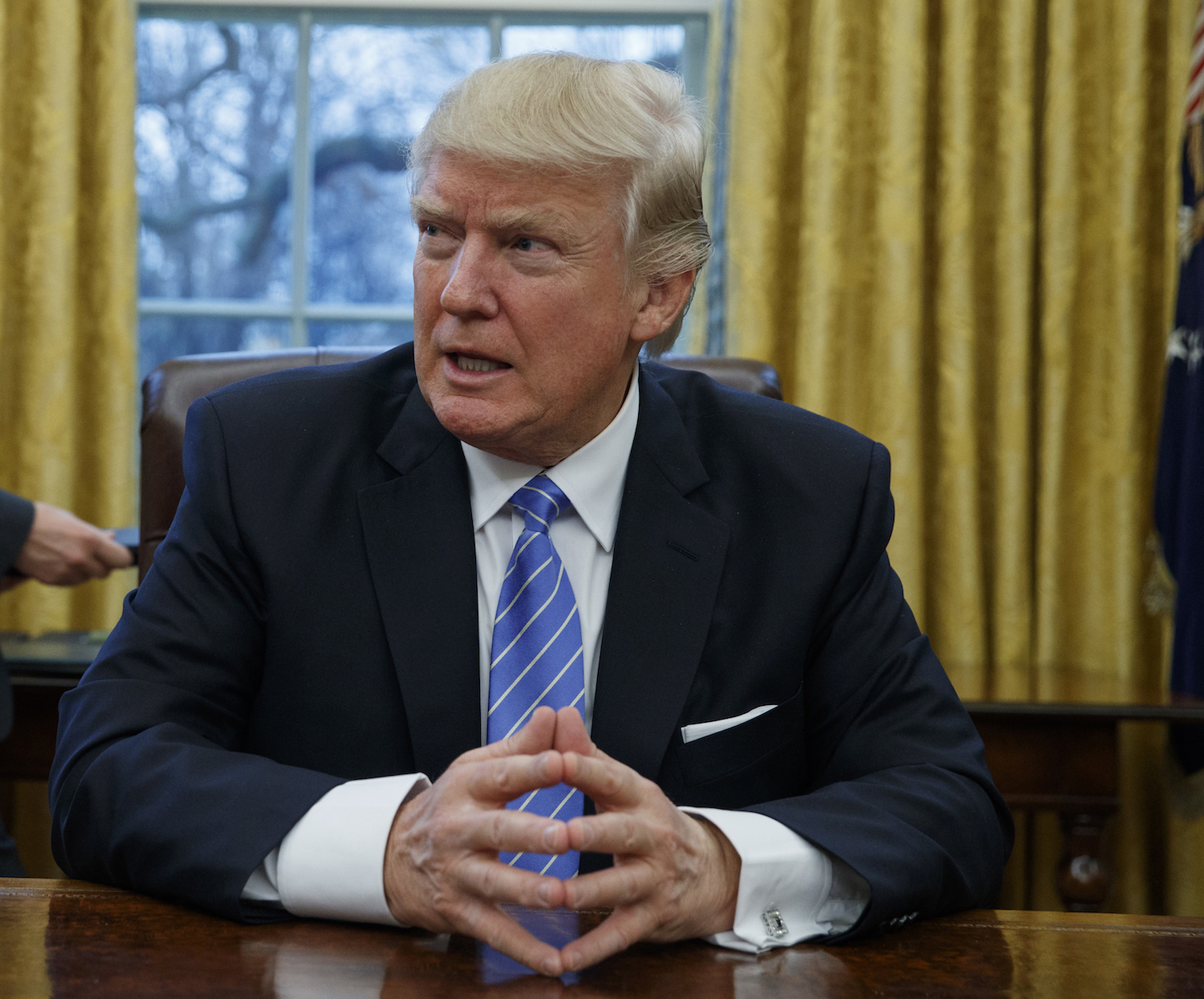 Trump resigned from hundreds of positions just before taking office