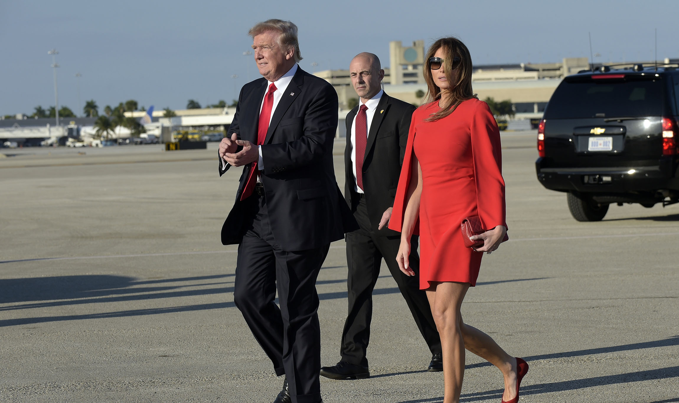 Wall of buses ready at Palm Beach airport in anticipation of Trump visit for Thanksgiving