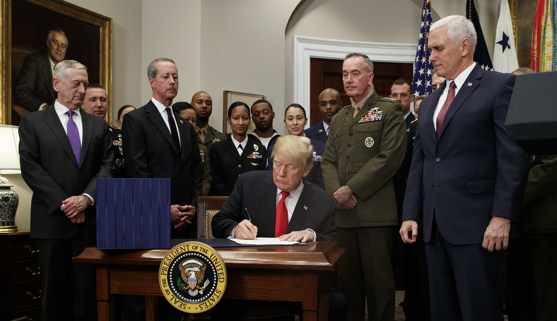 Trump ditches climate change in new national security strategy days after signing a bill calling it a ‘direct threat’