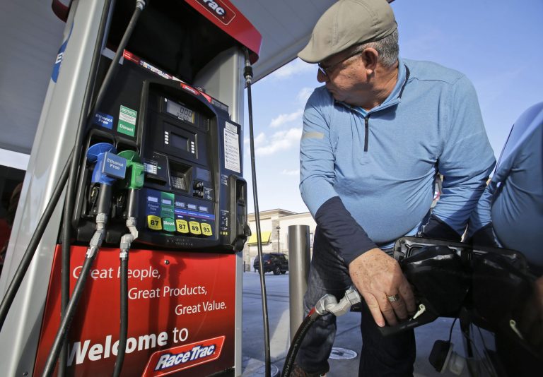 Annual inflation was slightly negative in April because of the falling cost of energy, even as other prices showed strong month-to-month gains. (AP Photo/Wilfredo Lee)