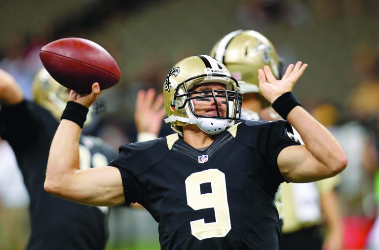 Gerald Herbert/AP
Quarterback Drew Brees and the New Orleans Saints averaged 41 points in eight games at the Superdome last year.