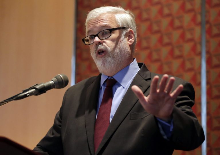Port Authority executive director Patrick Foye delivers his opening remarks before participating in a question-and-answer session at a breakfast meeting in New York, Thursday, May 29, 2014. The September lane closures caused massive traffic backups. It engulfed New Jersey Gov. Chris Christie's administration in scandal after it was revealed an aide ordered the closures, apparently for political retribution. (AP Photo/Richard Drew)