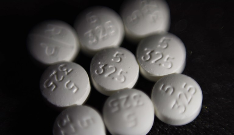 This 2017 file photo shows an arrangement of pills of the opioid oxycodone-acetaminophen, also known as Percocet. On Tuesday, West Virginia became the first state to get a waiver from the Center for Medicare and Medicaid Services to treat Neonatal Abstinence Syndrome, which affects newborns whose exposure to opioids is cut off at birth, through Medicaid. (AP Photo/Patrick Sison)
