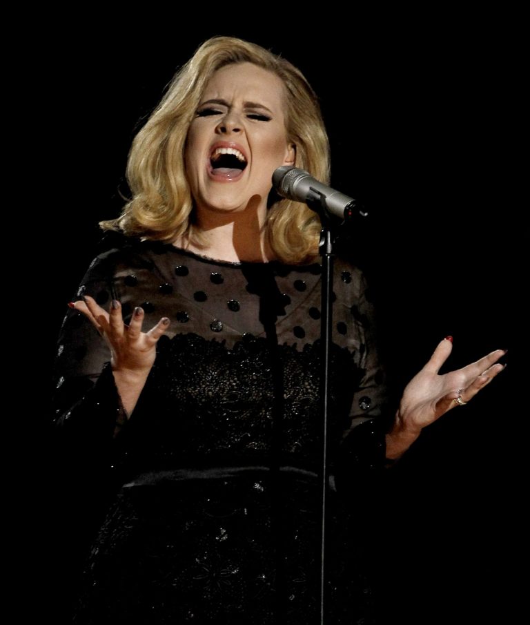   FILE - This Feb. 12, 2012 file photo shows Adele performing during the 54th annual Grammy Awards in Los Angeles. Adele has the yearâs top-selling album on iTunes. Her â21,â which recently passed the 10 million mark in sales, topped the list even though it was first released at the top of 2011. It remained popular this year, particularly after she nabbed five Grammys in February. (AP Photo/Matt Sayles, file)  