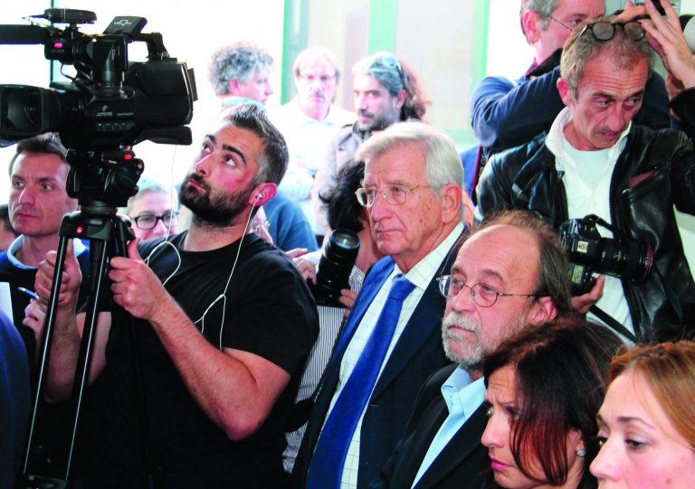 Defendants Claudio Eva, center, and Bernardo De Bernardinis, third from right, a former official of the national Civil Protection agency, listen to the verdict at L'Aquila court, Italy, Monday, Oct. 22, 2012. An Italian court has convicted seven scientists and experts of manslaughter for failing to adequately warn citizens before an earthquake struck central Italy in 2009, killing more than 300 people. The court in L'Aquila Monday evening handed down the convictions and six-year-prison sentences to the defendants, members of a national 