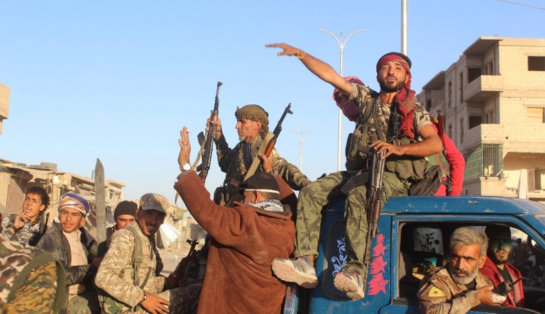 A commander with the Syrian Democratic Forces says Raqqa's national hospital, one of the militants' last holdouts in city, has been captured. (Syrian Democratic Forces via AP)