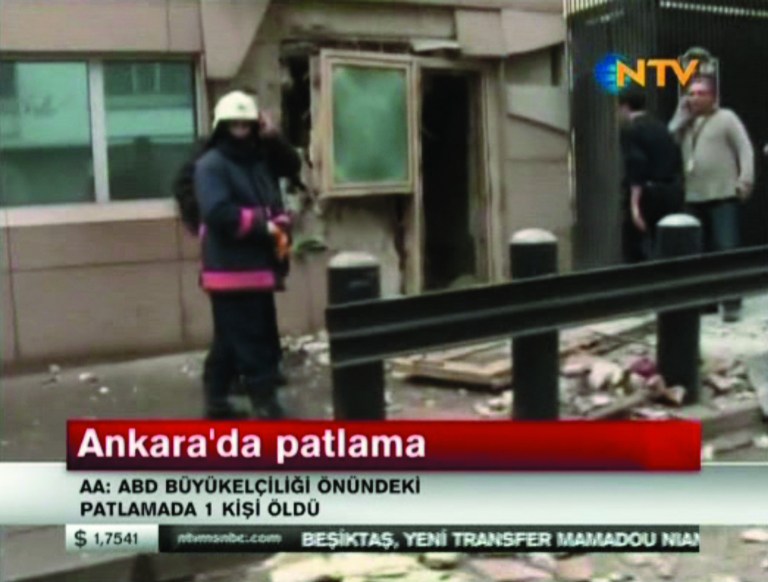 In this image made from video, emergency personnel are seen in front of a side entrance to the U.S. Embassy following a blast, Ankara, Turkey, Friday, Feb. 1, 2013. Turkish news reports say an explosion in front of the U.S. Embassy in the Turkish capital Ankara has injured several people. (AP Photo/NTV) TURKEY OUT